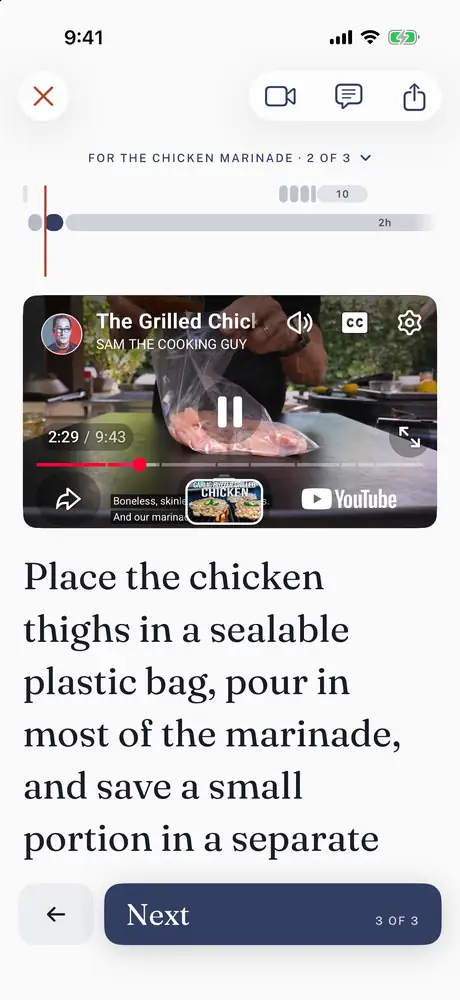 The next step, bag the chicken thighs with the marinade, for Sam the Cooking Guy's grilled chicken, with his video at that moment.